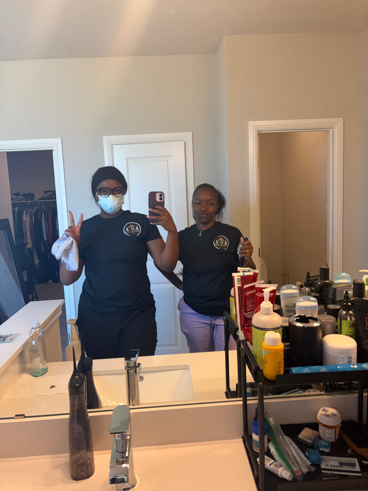Forever Family team members during a bathroom deep clean