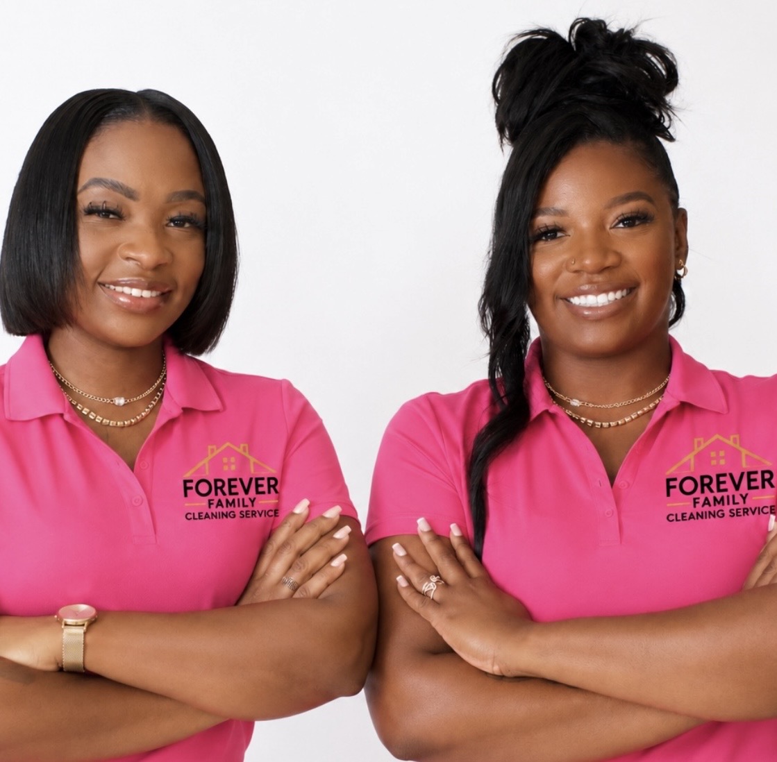 The two owners of Forever Family Cleaning Service in branded polos