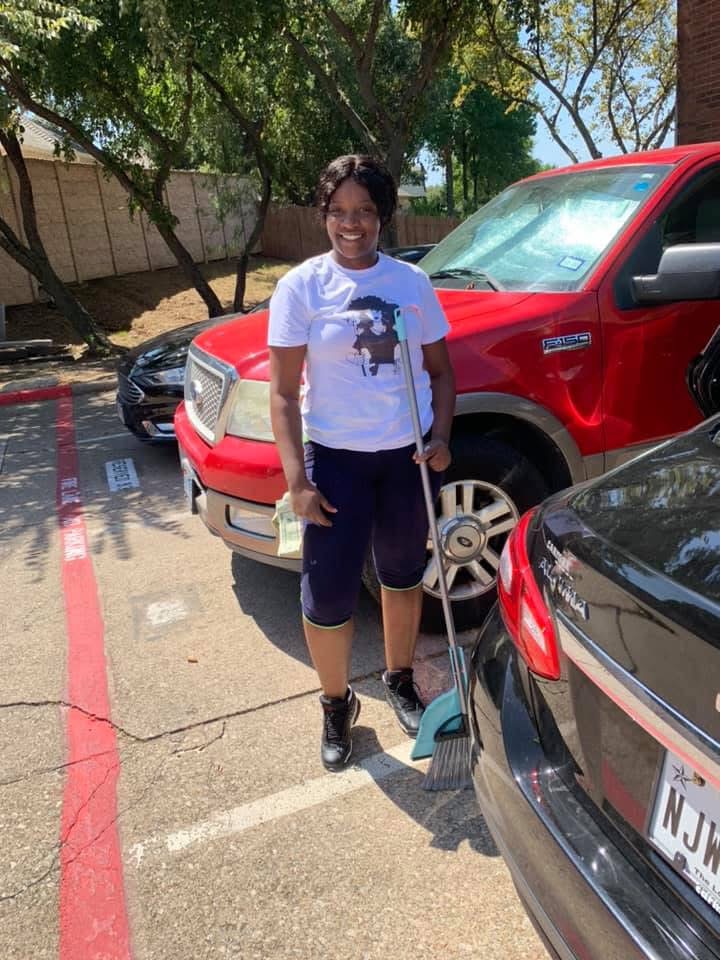 Forever Family team member arriving on a job with cleaning tools